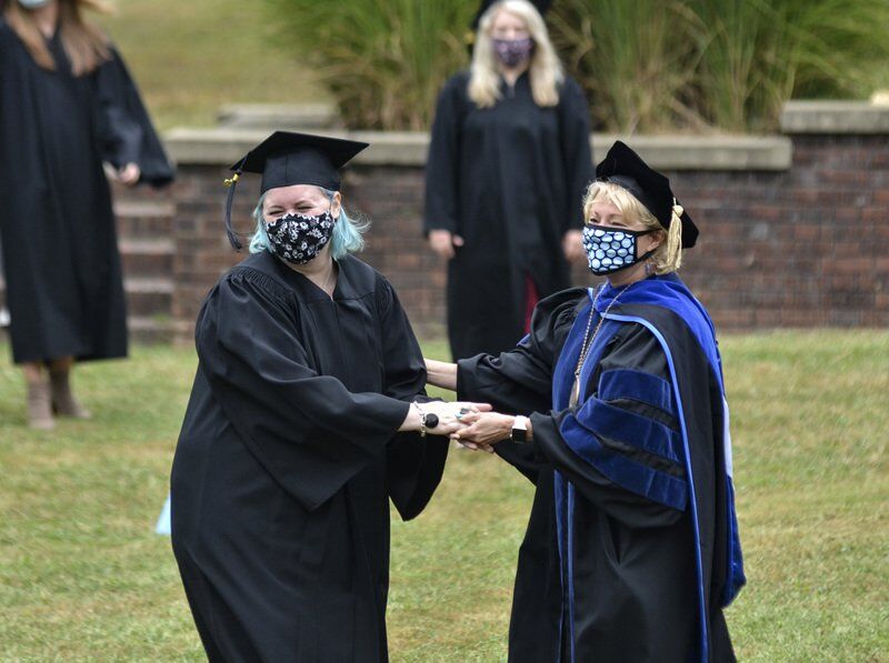 Worth the wait: 60 SMWC students get Woods Ring in ceremony delayed six months because of COVID-19